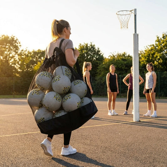 Netball carry bag with 12 netballs, mesh design for easy transport