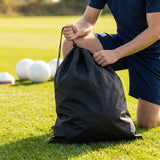 Football kit bag with durable PVC exterior, ideal for sports equipment transport