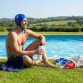 Set of 13 water polo caps in blue and white with red goalkeeper caps, featuring durable nylon material.