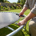 Trampoline spring tool with ergonomic handle and steel hook