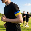 Blue and yellow sports armband made from elastic polyester