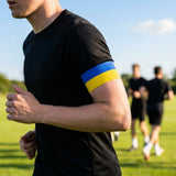 Blue and yellow sports armband made from elastic polyester