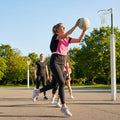 Reversible netball bibs in various colours and sizes for sports teams