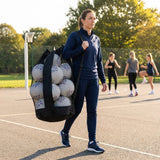 Netball carry bag with 12 netballs, mesh design for easy transport