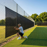 Green Tennis Court Windbreaks on an outdoor tennis court