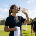 Hygienic water bottle with contactless nozzle for sports use