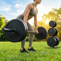Black Olympic bumper plates made from Virgin rubber