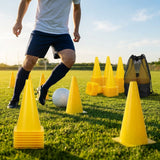 Set of vibrant football training cones in various sizes and colours