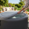 Inflatable hot tub cover in grey, made from durable PVC