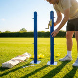 Pickleball posts with base plates in blue, black, and green for club use