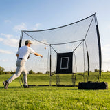 Baseball backstop net in use during outdoor practice