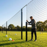 Pitch divider net system with galvanised steel posts and tensioned net