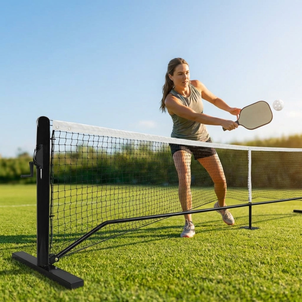 Pickleball posts with base plates in blue, black, and green for club use