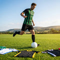Men's striped football kit with shirt, shorts, and socks