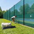 Removable tennis court surround system with steel posts and HDPP netting