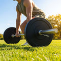 Black Olympic bumper plates made from Virgin rubber