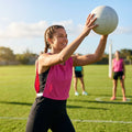 Vibrant netball bibs made of polyester mesh for schools and clubs