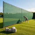 Removable tennis court surround system with steel posts and HDPP netting