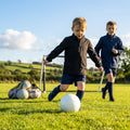 Kids' windbreaker jacket in black and navy for outdoor and sports use