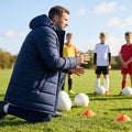 Longline padded coat in black and navy blue, water-repellent for training