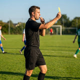 Football referee kit with fluro yellow or black shirt, shorts, and socks
