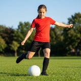 Junior girls' base layer top in various colours for sports and training
