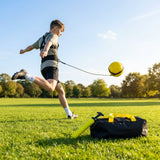 Football kick trainer with adjustable neoprene belt and training ball
