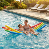 Swimming pool noodles in vibrant colours made from EVA foam