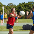 Vibrant netball bibs made of polyester mesh for schools and clubs