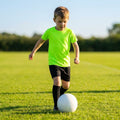 Kids' base layer top in vibrant colours for ages 5-10, ideal for sports