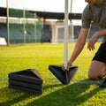 Corner flag bases in black rubber for sports pitches