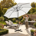 Double-sided garden parasol providing outdoor shade with steel frame