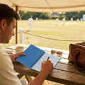 Cricket scorebook with soft cover and ring-bound design