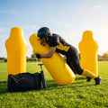 High-visibility American football training dummies in yellow PVC