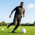 Lightweight padded gilet in black or navy, suitable for outdoor wear