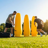 High-visibility American football training dummies in yellow PVC