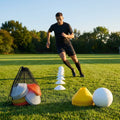 Set of vibrant football training cones in various sizes and colours