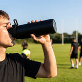 Hygienic water bottle with contactless nozzle for sports use