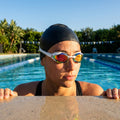 Racing swimming goggles with panoramic mirrored lenses